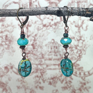 Sparrows in a teal sky with antique brass and antique copper highlights